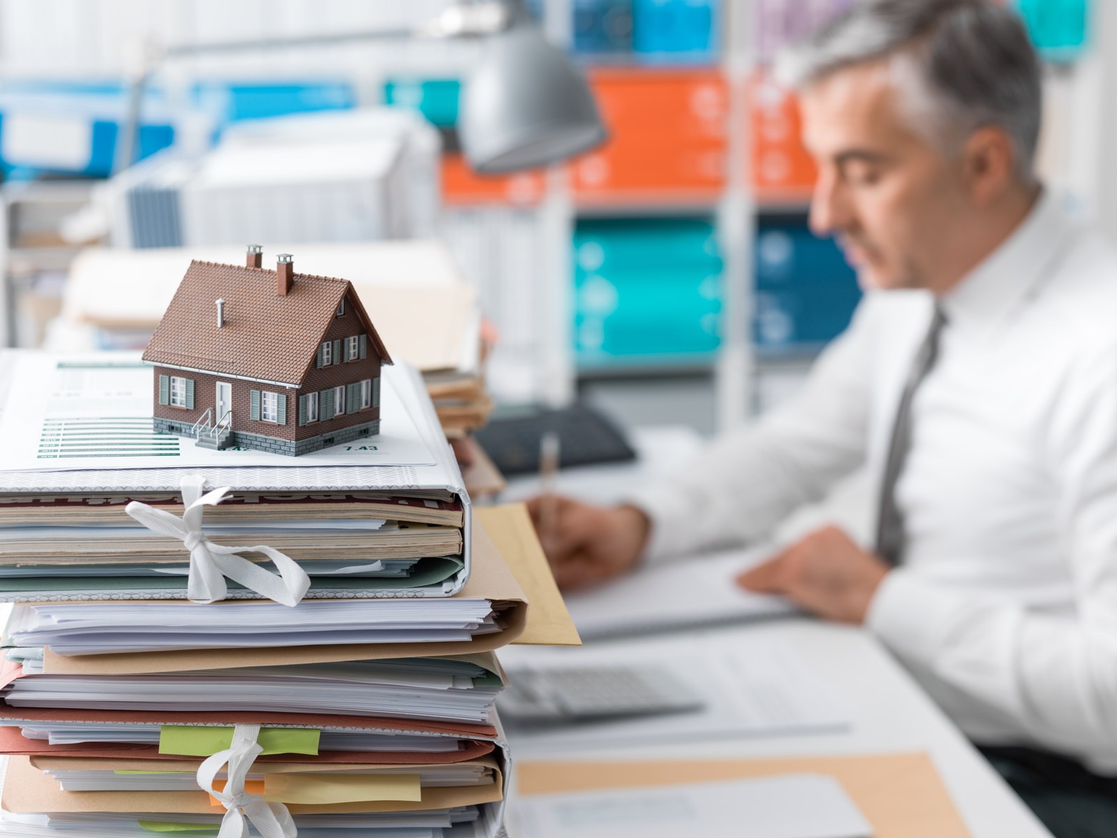 Property manager reviewing real estate compliance documents