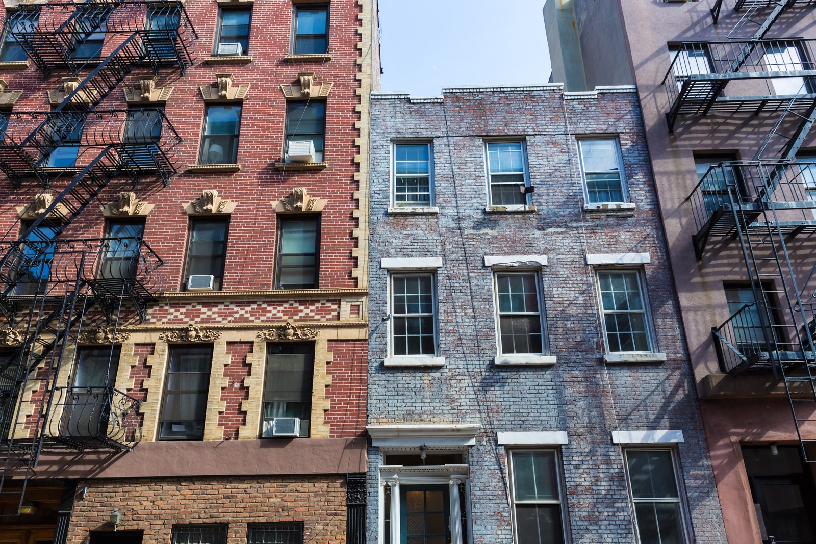 New York apartment buildings illustrating different rental markets